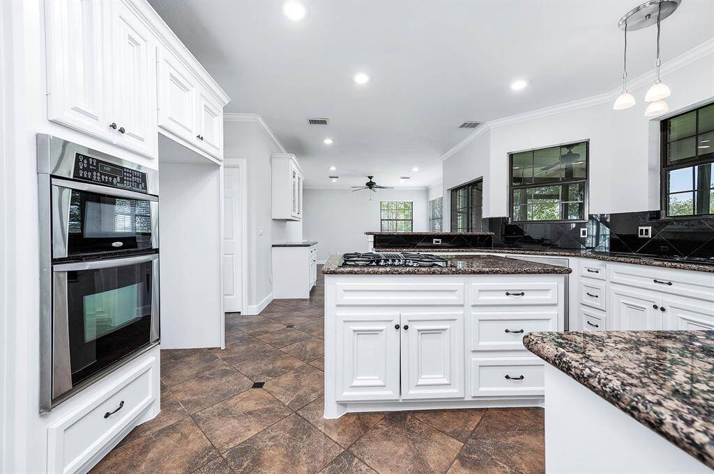 Lots of storage in the kitchen with a large walk in pantry