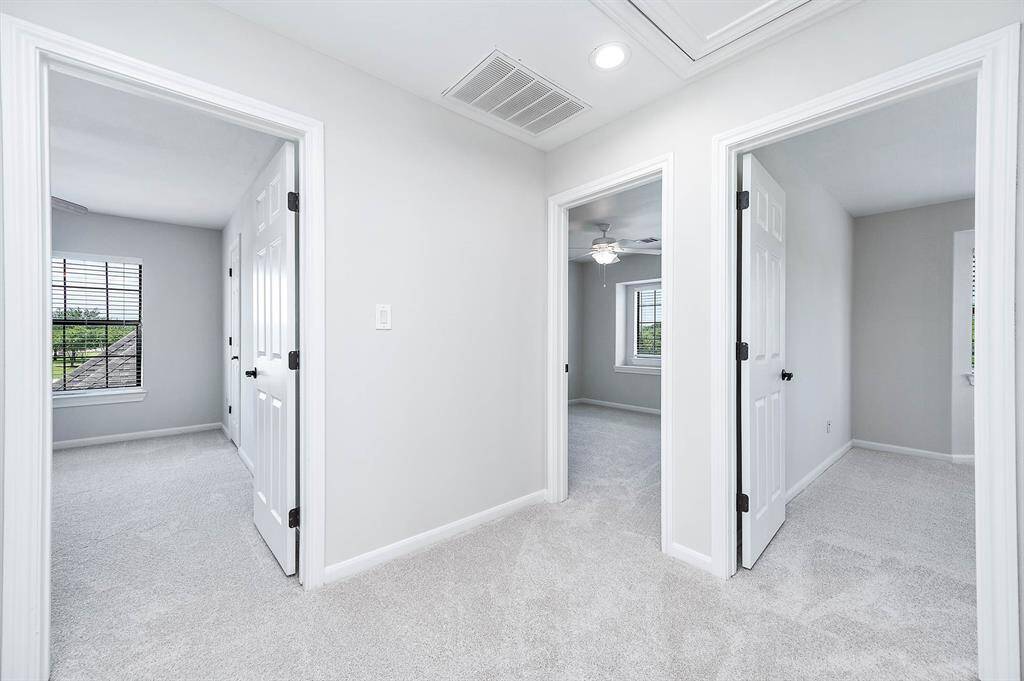 Hallway to 3 bedrooms upstairs