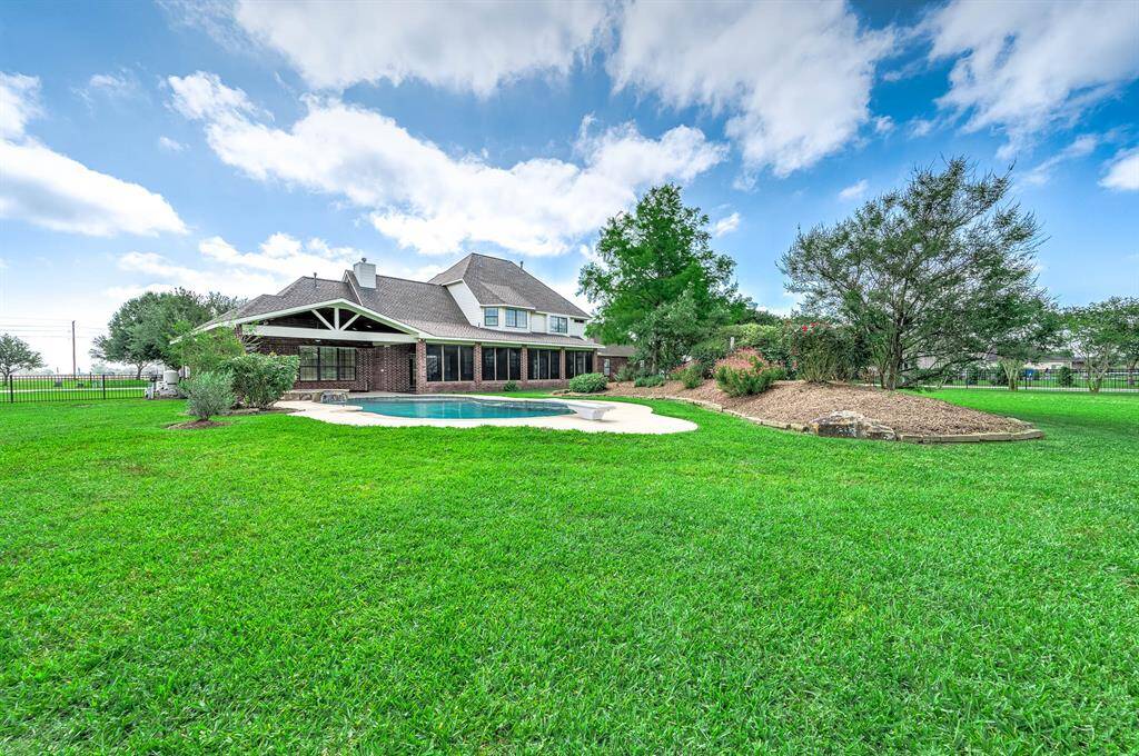 1.5 acres with pool and pond
