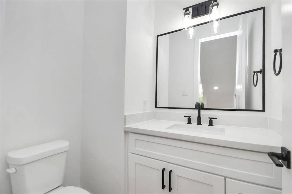 Half bathroom for guest on the second floor
