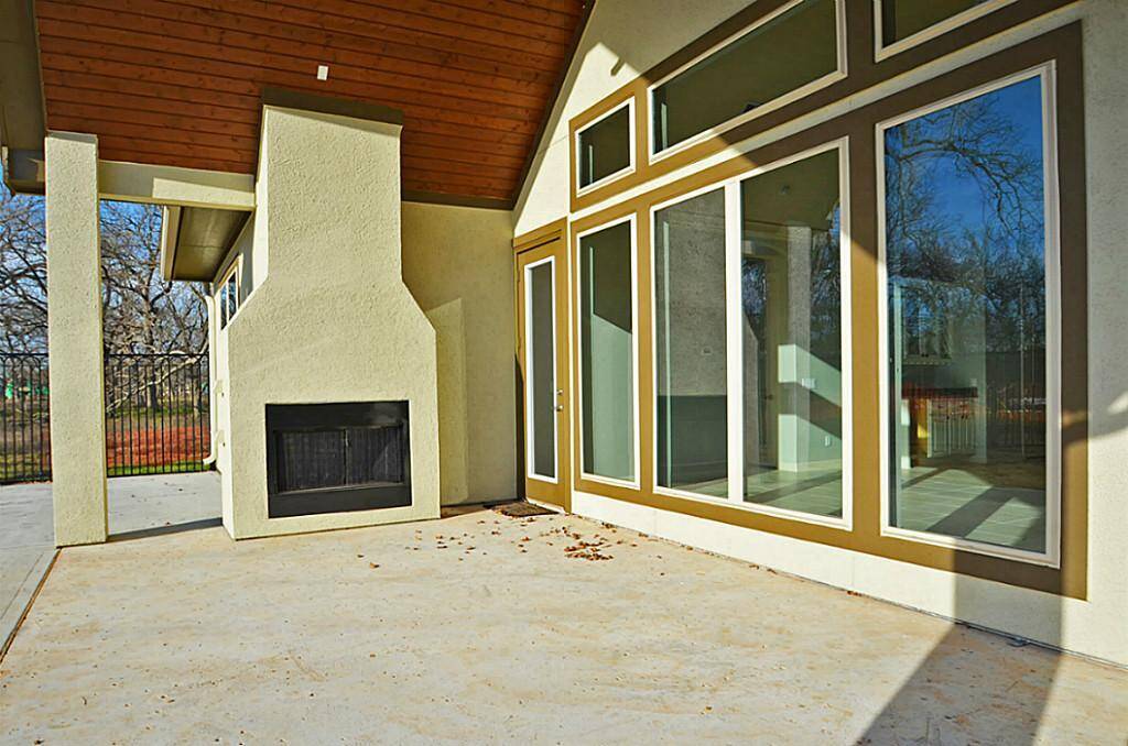 oversize back patio with fireplace