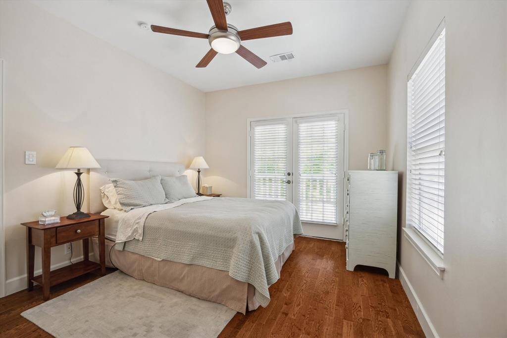 Secondary bedroom on the 2nd floor with French doors leading to the balcony.