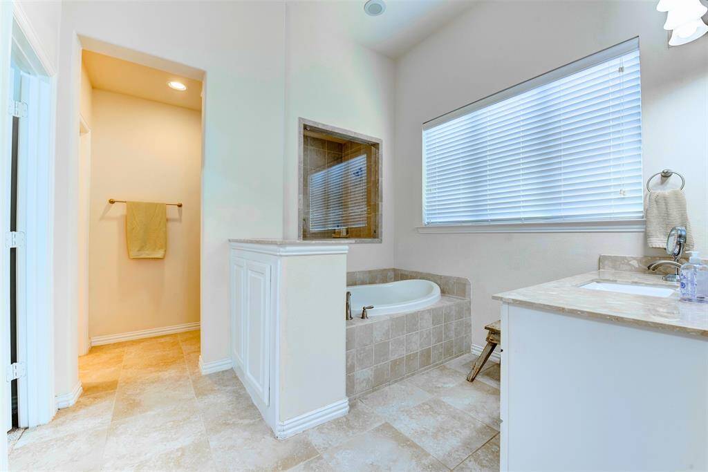 Spacious Master Bathroom complete with Soaking Tub and huge walk in Shower