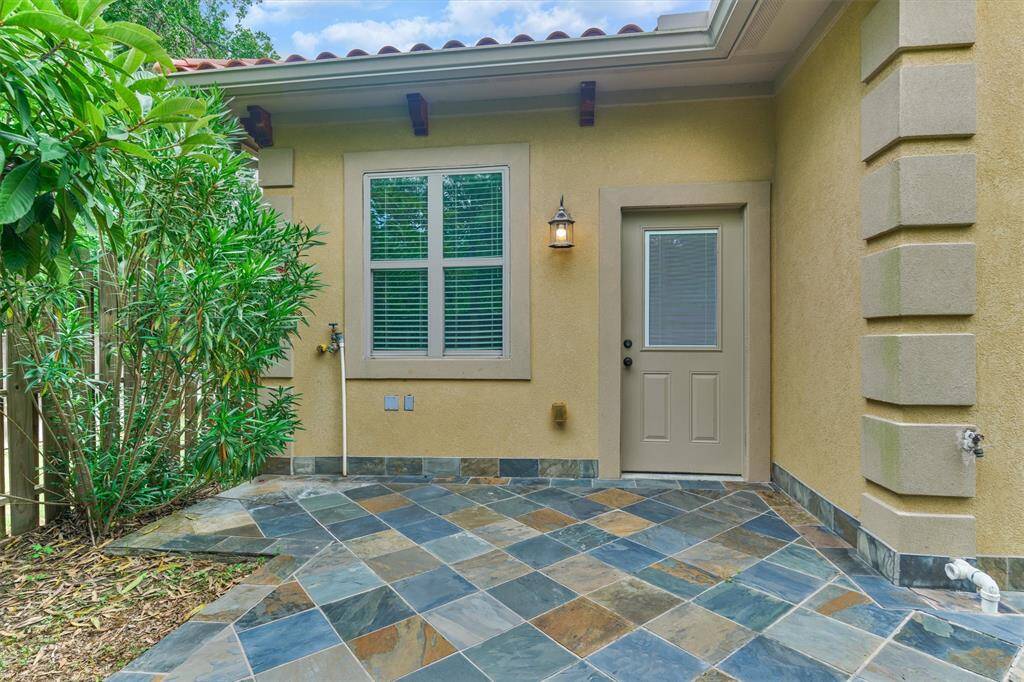 Detached 1-bedroom casita offers privacy and versatility for guests or extended family.
