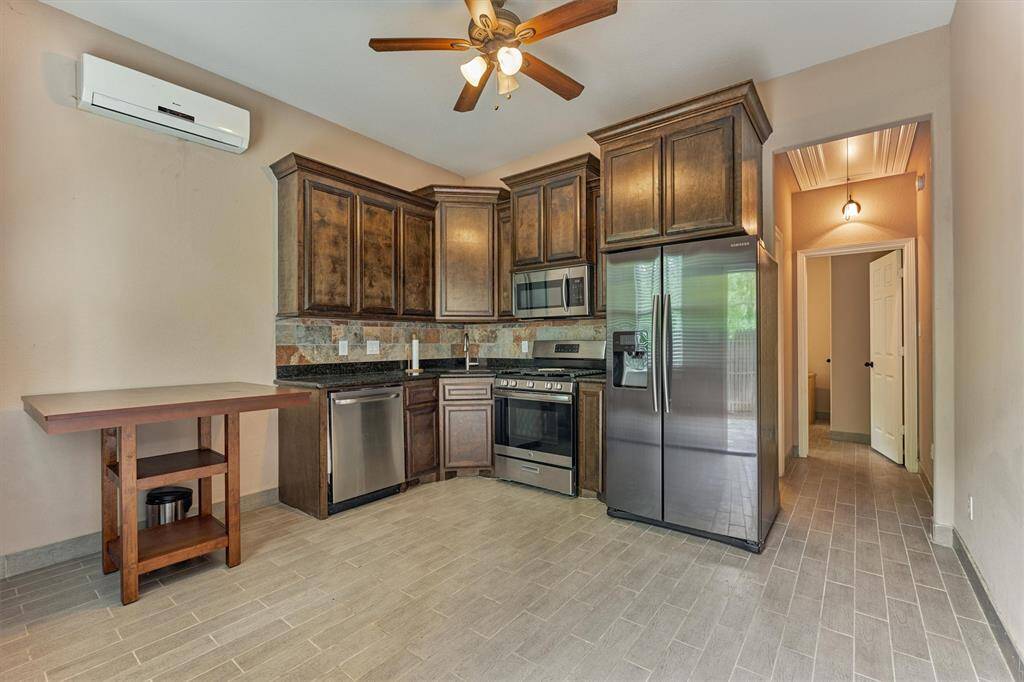 Casita features full kitchen and dining space—ideal for poolside meals and convenience.