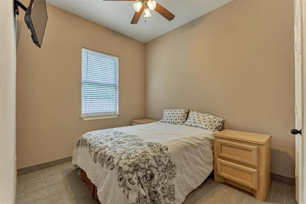 Casita bedroom opens to full bath—comfort and independence for guests or tenants.
