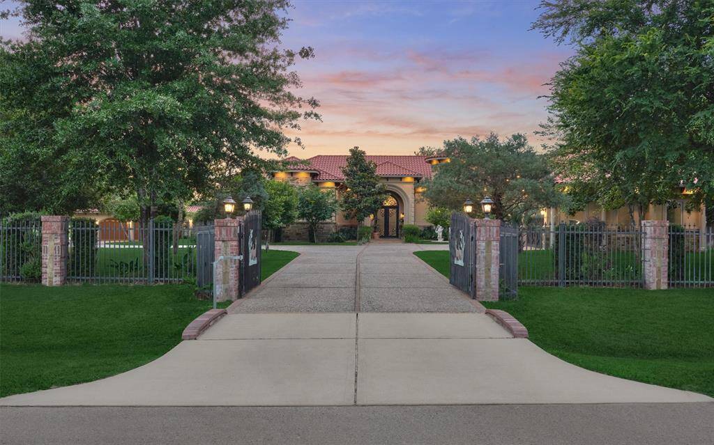 Private gated entry with keypad and vehicle sensor for security and convenience.