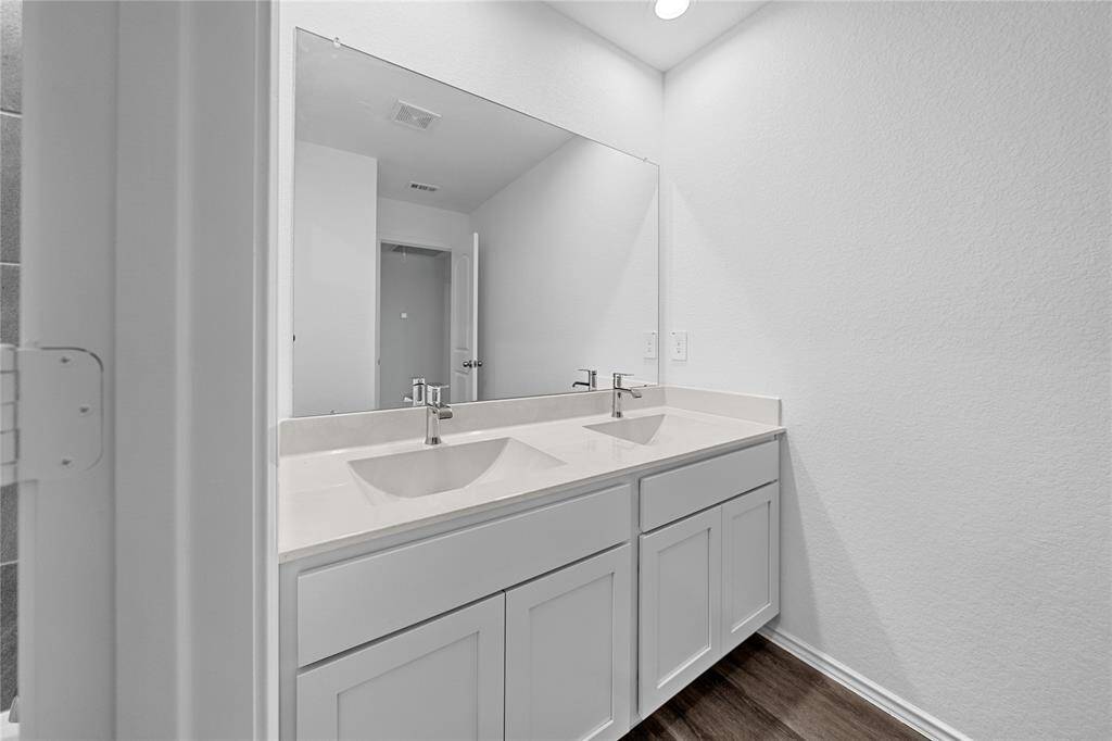 Dual sink in secondary bathroom upstairs