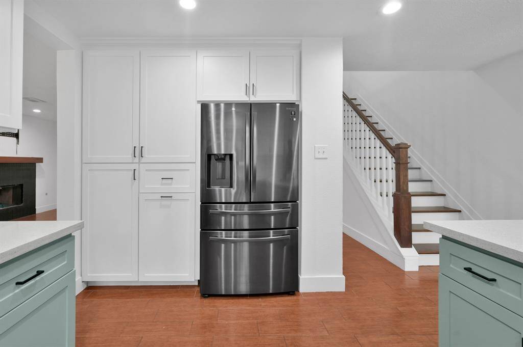 This kitchen has no shortage of cabinets!