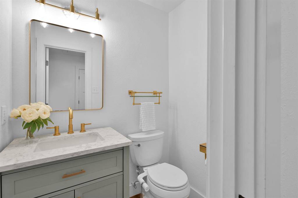 This beautifully updated half bathroom is located on the first floor.
