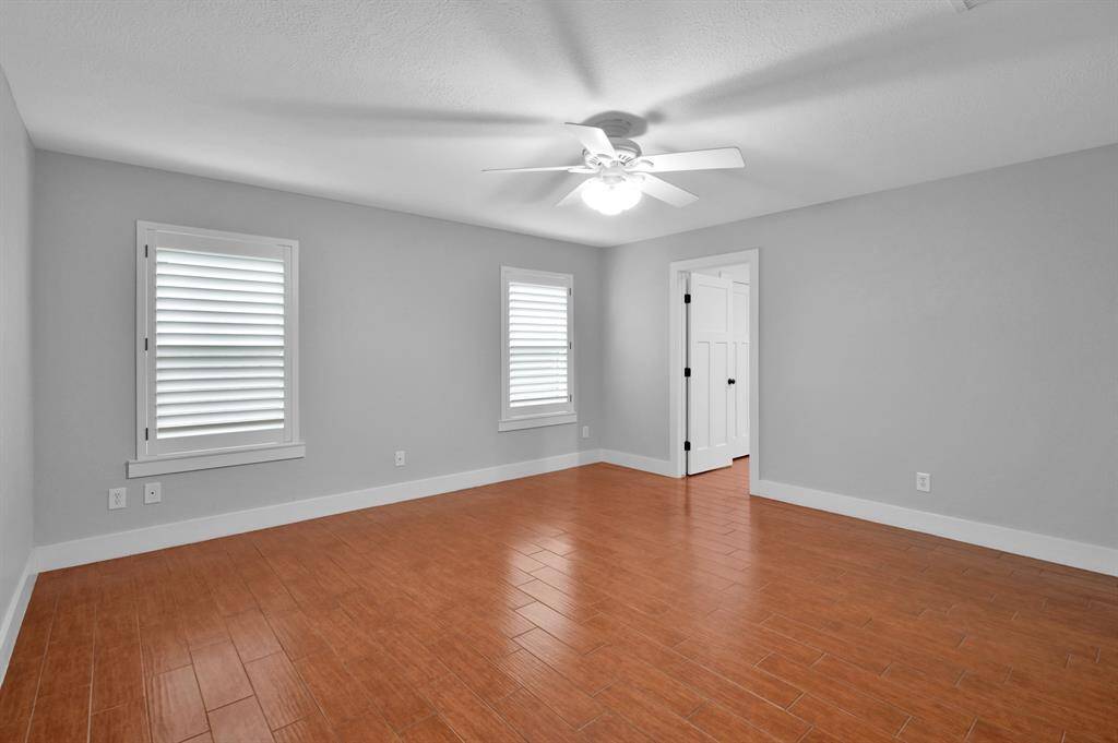 The spacious primary bedroom is located on the first floor for your convenience.