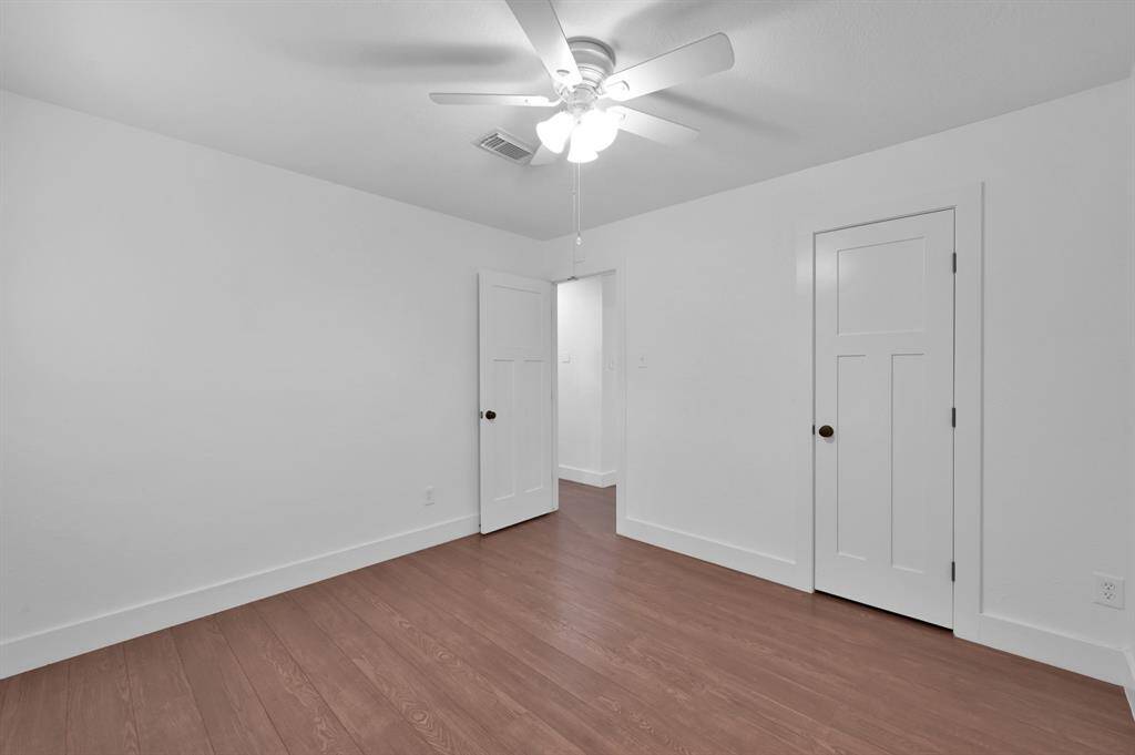 Another view of the first secondary bedroom.