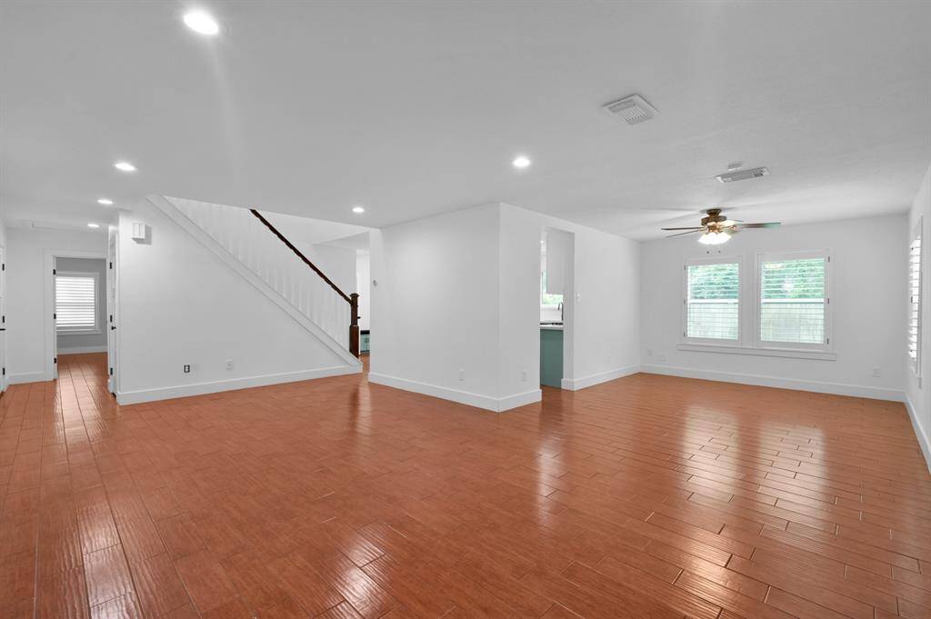 Open living area with a view into the dining room and easy access to the kitchen.