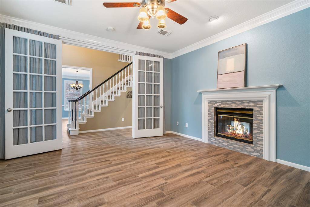 A lovely, large spacious room with 2 sided fireplace.  Please note the owners request the fireplace be enjoyed with battery operated candles only.  This room is ideal for a study, formal living area or anything you desire!