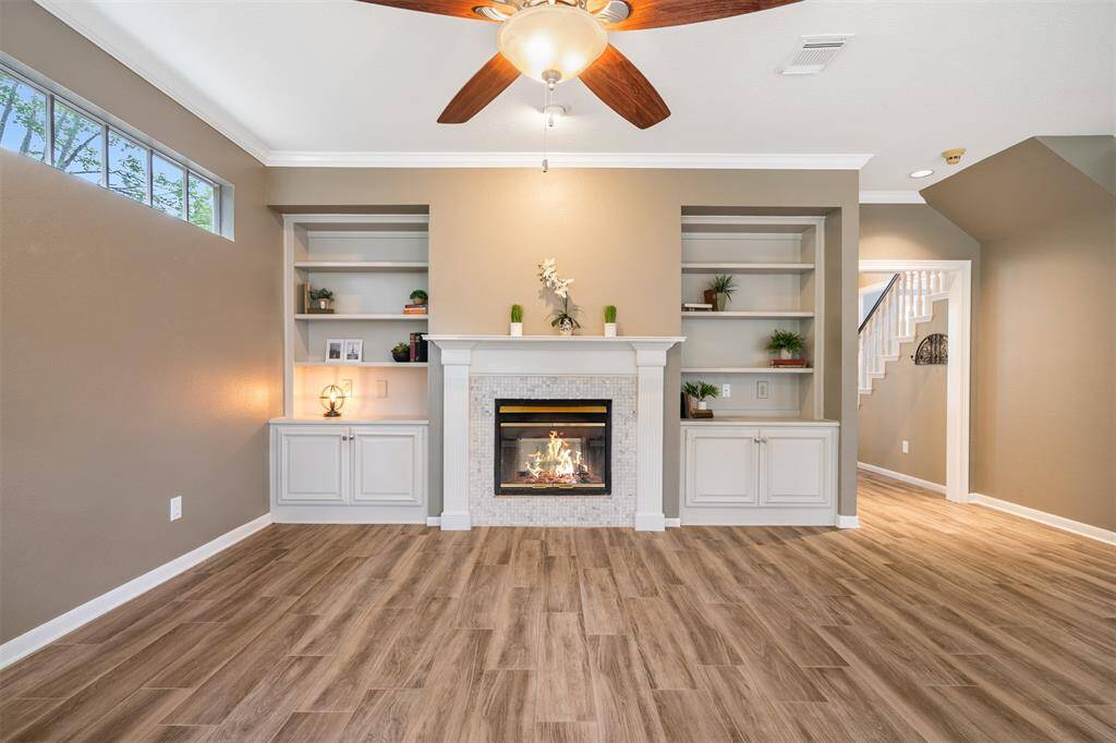 The family living area is open to the kitchen breakfast area.  Please note the owners request the fireplace be enjoyed with battery operated candles only.