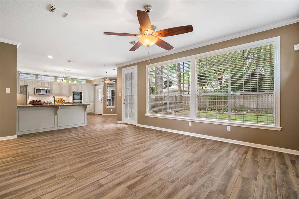 The family living area is open to the kitchen breakfast area.  Please note the owners request the fireplace be enjoyed with battery operated candles only.