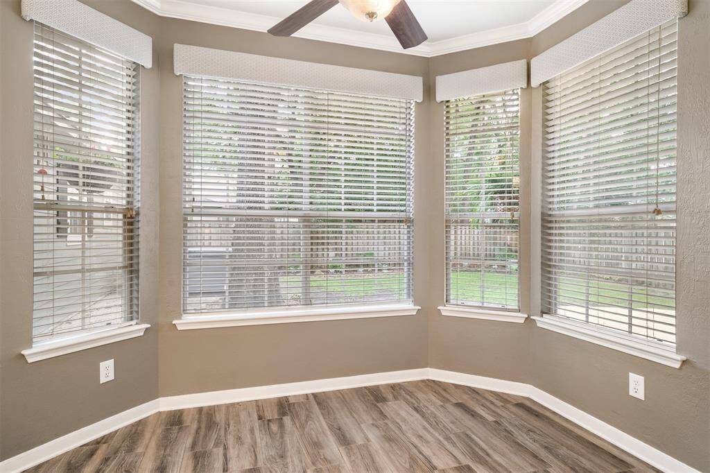 Great breakfast area with a wall of windows.