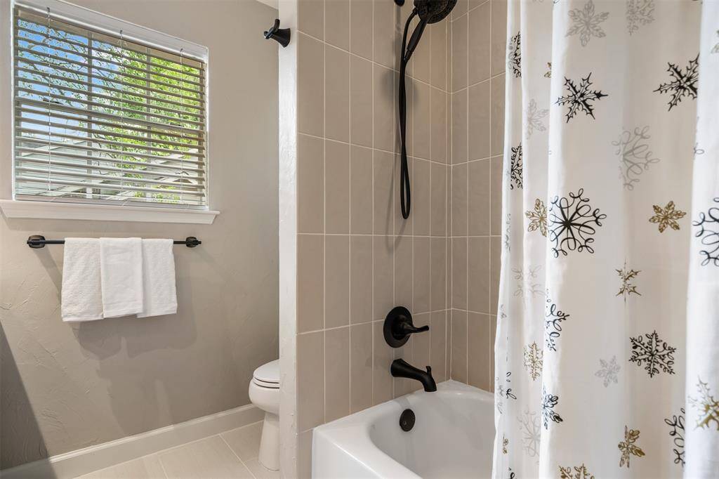 Secondary bathroom, with so many updates!  Cute as a button.