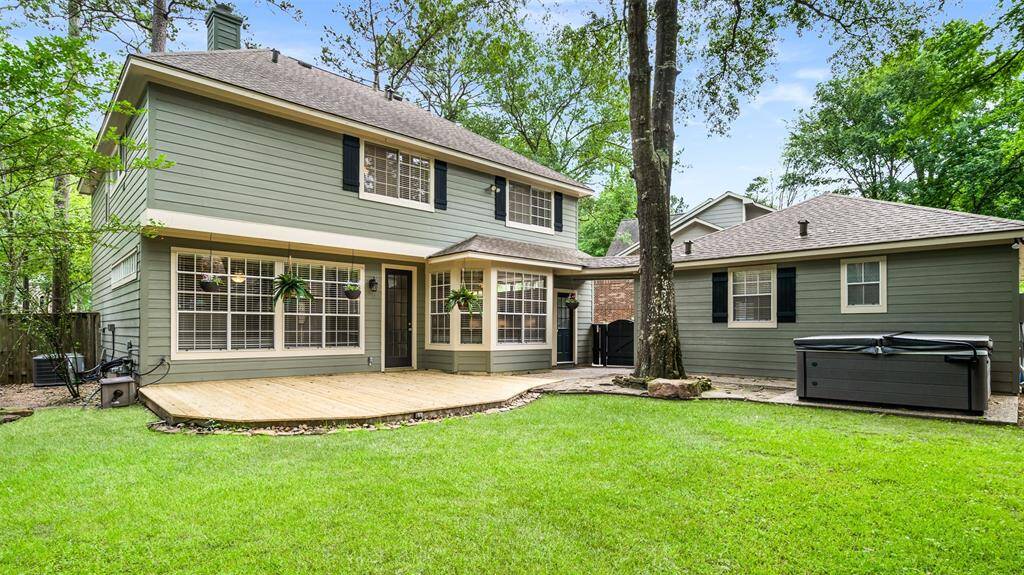 Lovely back yard and new wood decking.  Please note the hot tub will be removed and is not included with the lease.