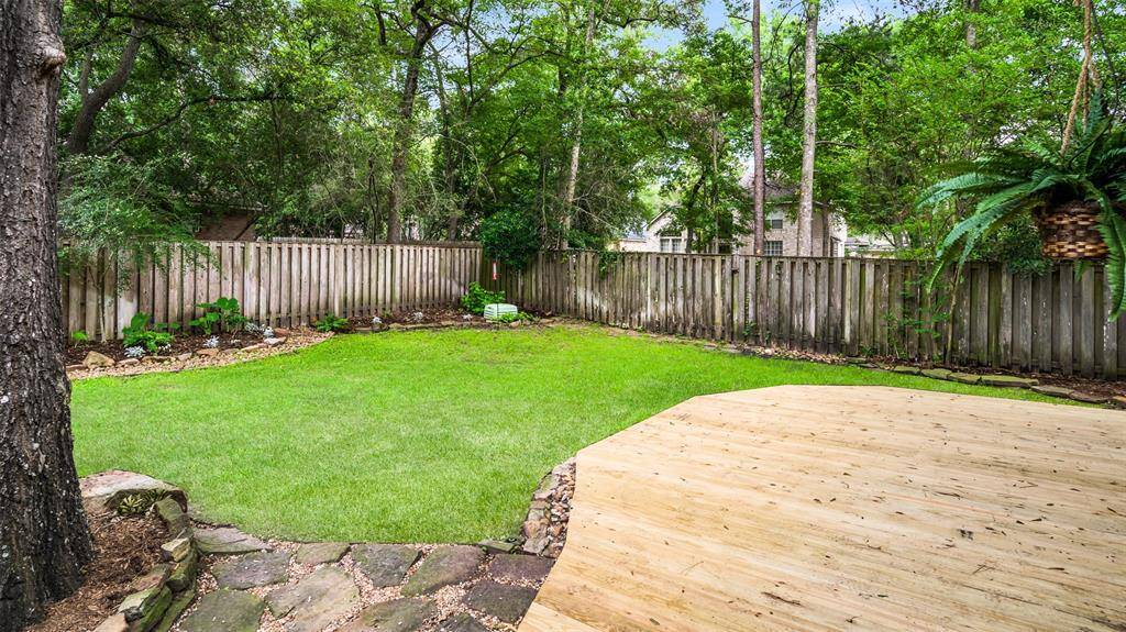 Lovely back yard and new wood decking.  Please note the hot tub will be removed and is not included with the lease.