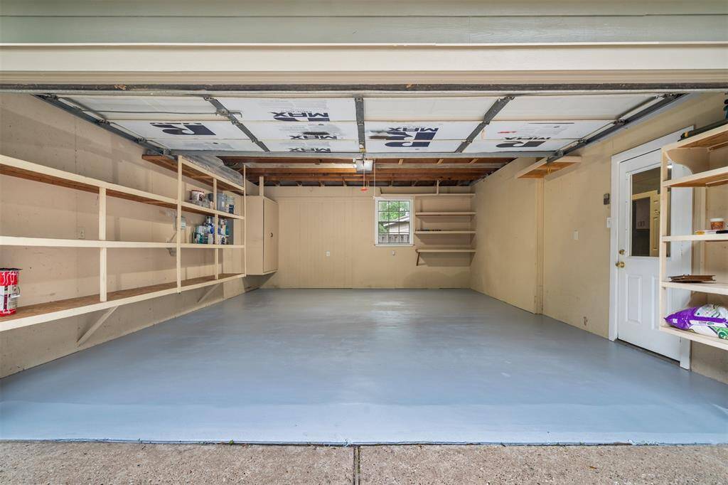Two Car garage with a fabulous Extra Room next to it.  The space offers t's own AC unit!