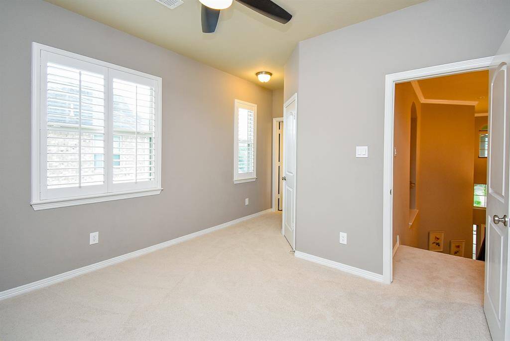 Large bedroom upstairs connects to bathroom