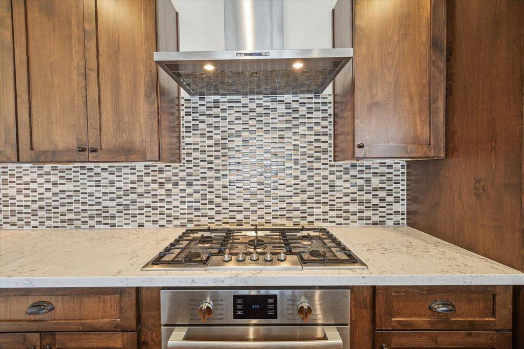 Custom tile work and tall ceilings.