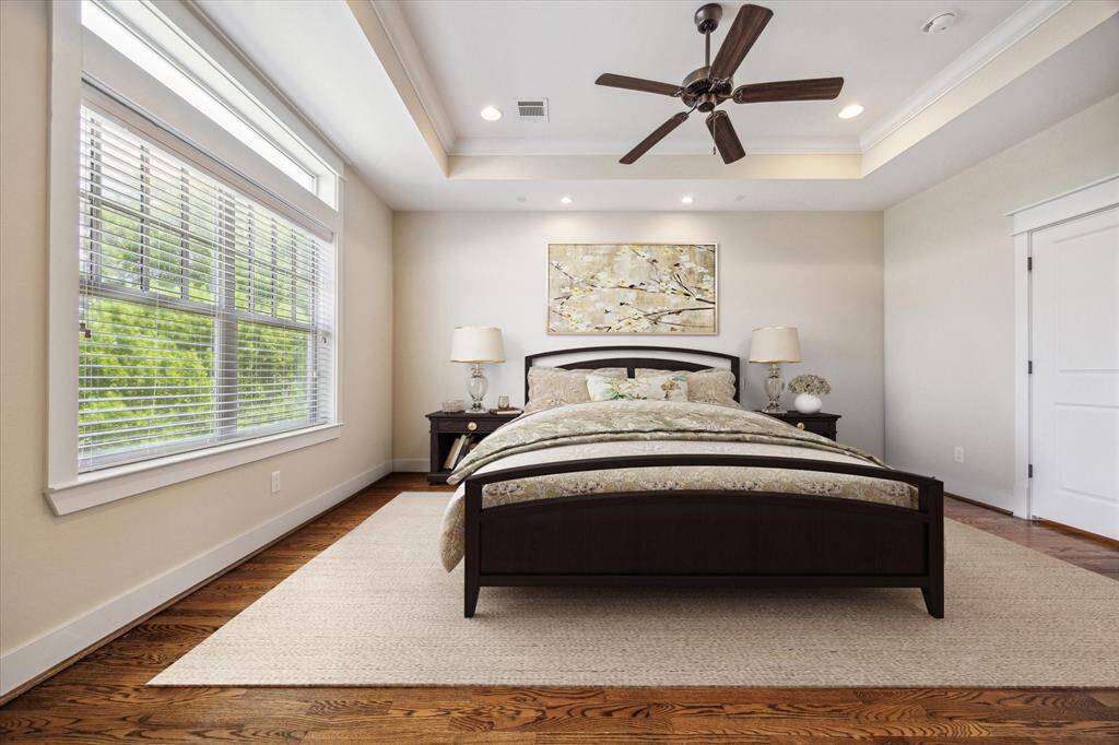 Master bedroom image virtually staged - imagine waking up to the pretty view out the window.