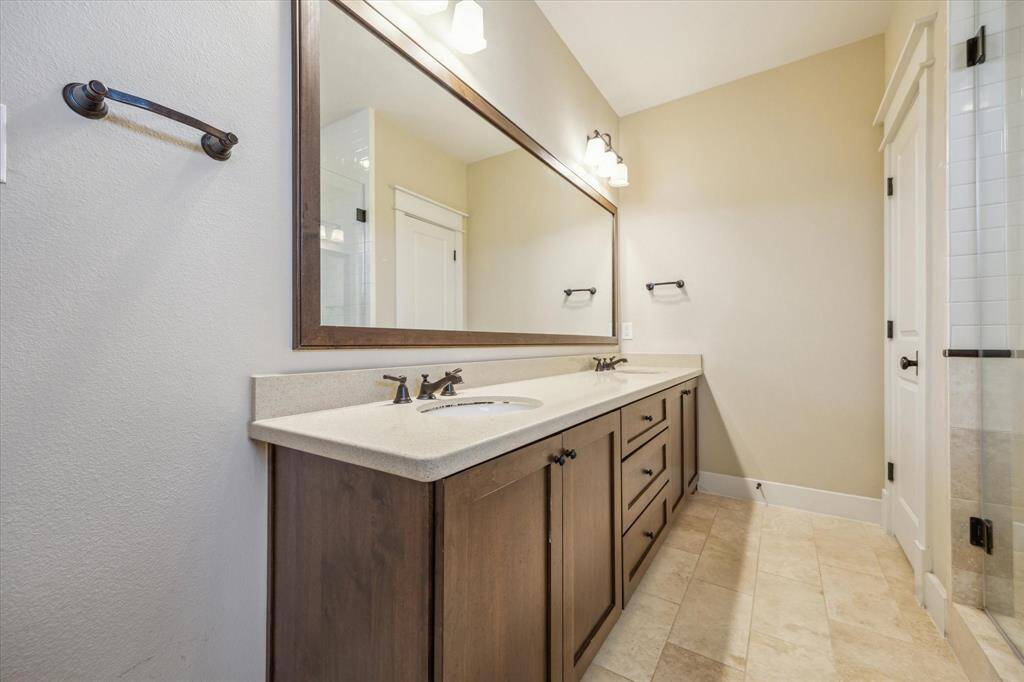 Double sinks located in primary bathroom.