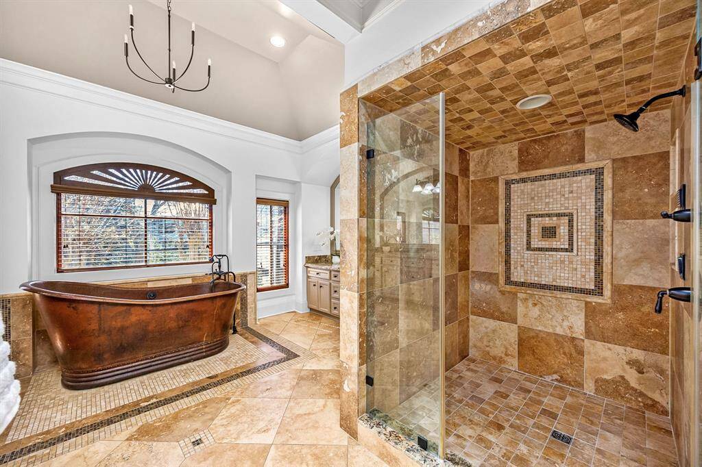 Oversized shower with body spray system and oversized soaking tub