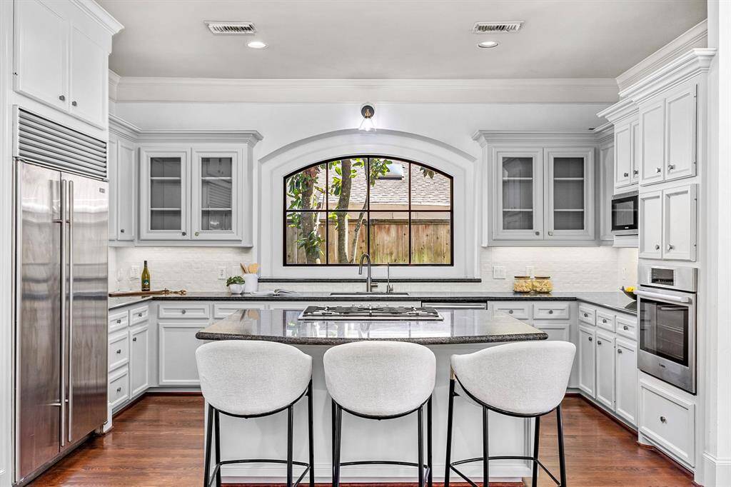 Kitchen with Double Island, SubZero Fridge, Bosch Appliances
