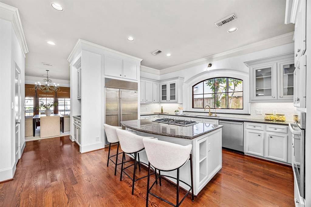 Kitchen flows naturally to the breakfast nook and formal dining