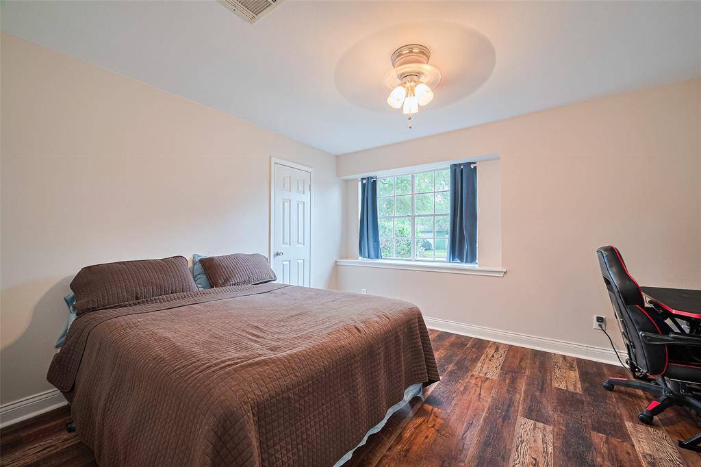 Spacious secondary bedroom with walk in closet.