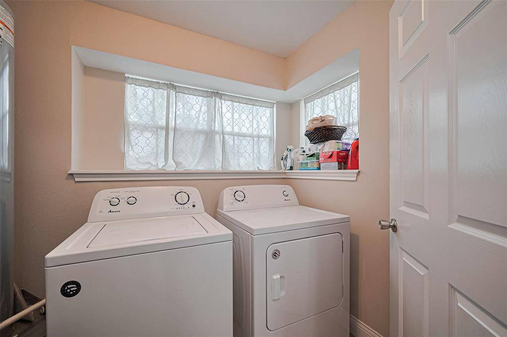Large in home utility room with natural light right off the kitchen.