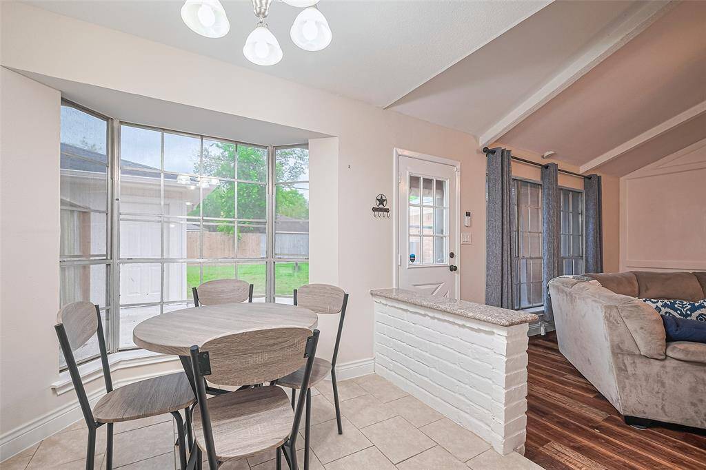 Breakfast nook overlooking the backyard and open to the living room.
