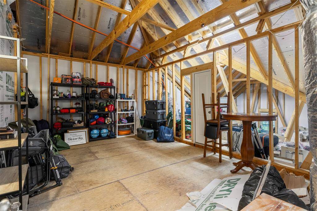 The ultimate attic space that is ready to store GALORE or be converted into your very own media room! The flooring and framework are already done for you!