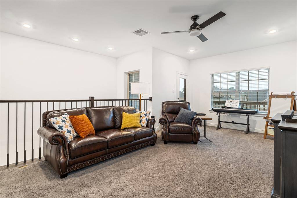 The upstairs gameroom leads you straight to the second level patio where you can enjoy the sunrise!