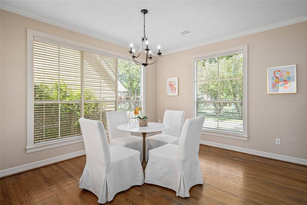 Imagine coffee here overlooking both Loftin Park and your own flowered greenery.