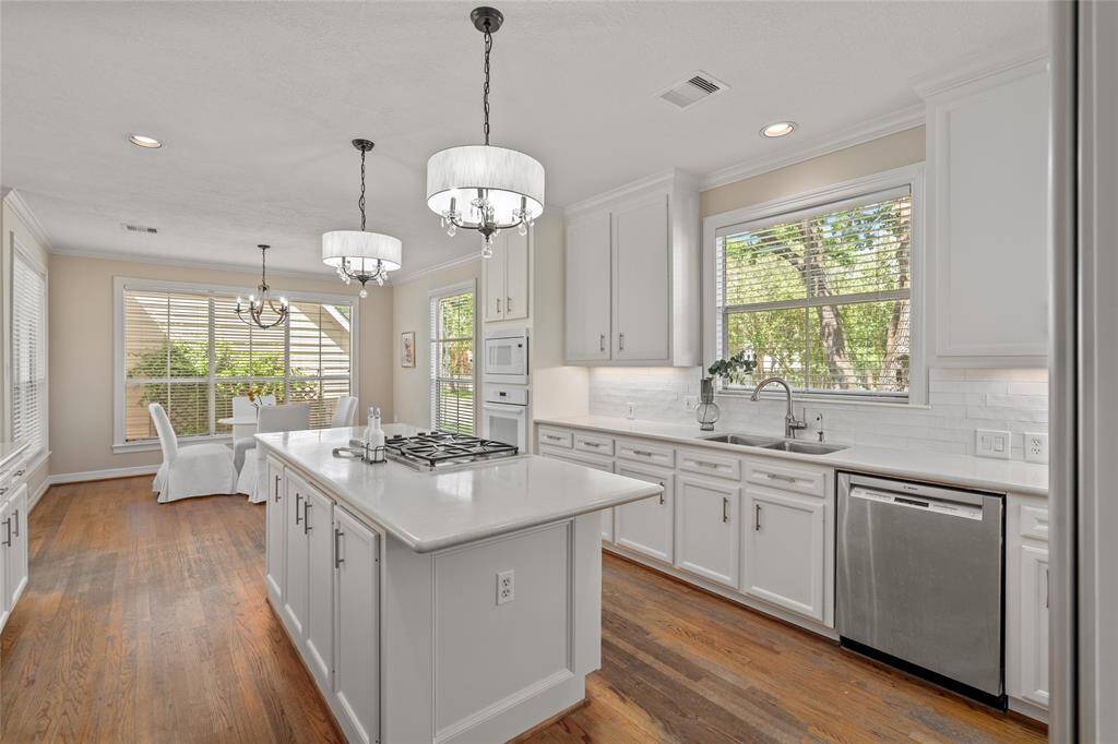 2025 lighting and backsplash; Subzero ref, and some updated appliances.