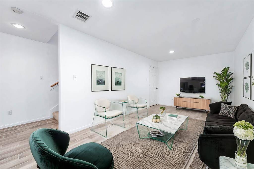 Private space with separate access to the back patio—perfect as a potential mother-in-law suite or private quarters.