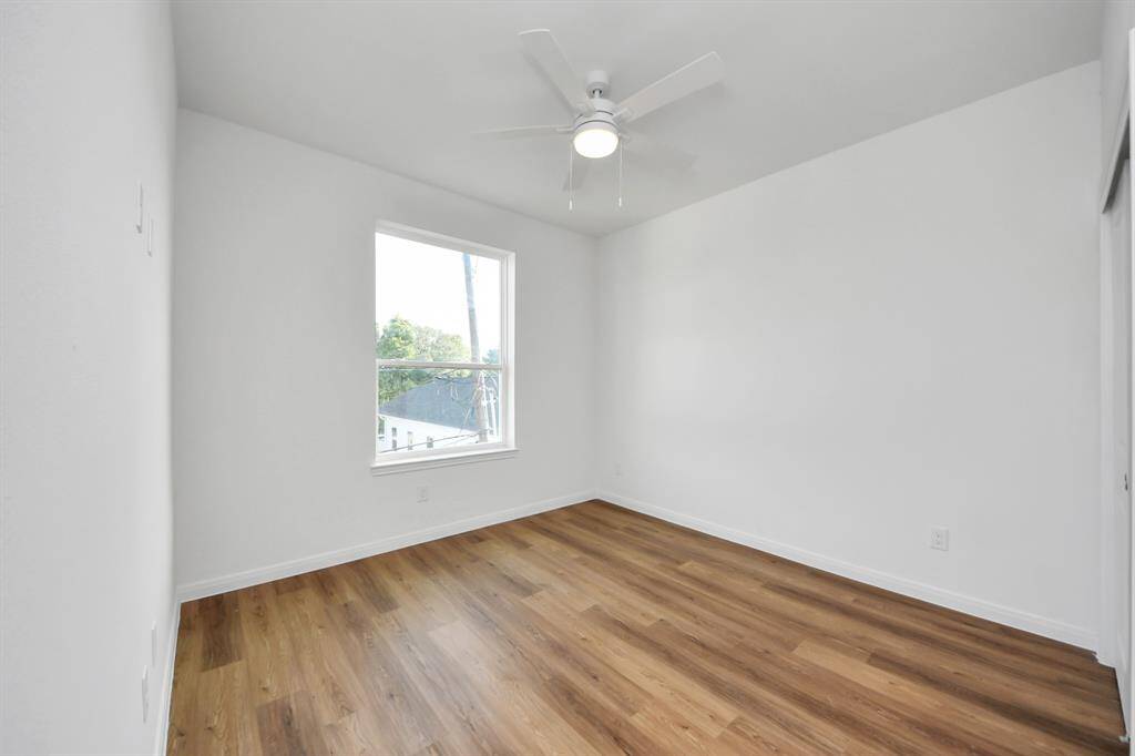 The second bedroom with natural lighting.