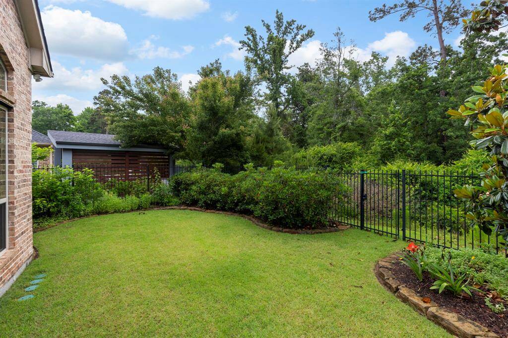 Private gate offers direct access to the nature preserve and walking trails—right in your backyard!