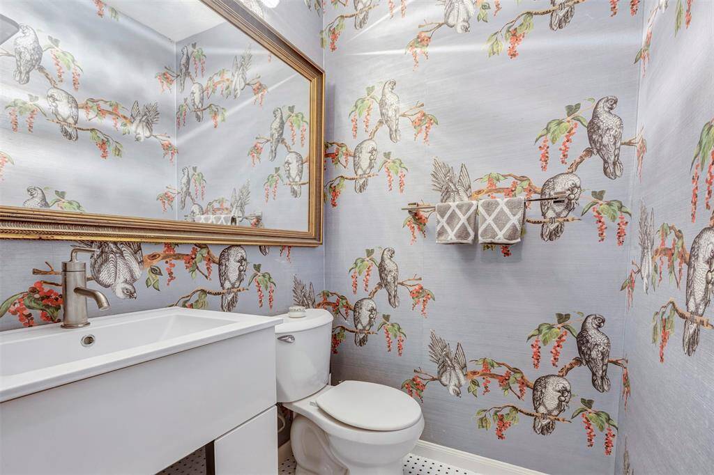 Renovated half bath conveniently located near the living and breakfast areas.