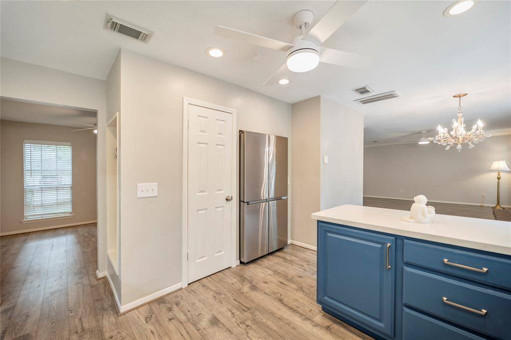Awesome 4 door Samsung built-in refrigerator and walk-in pantry.