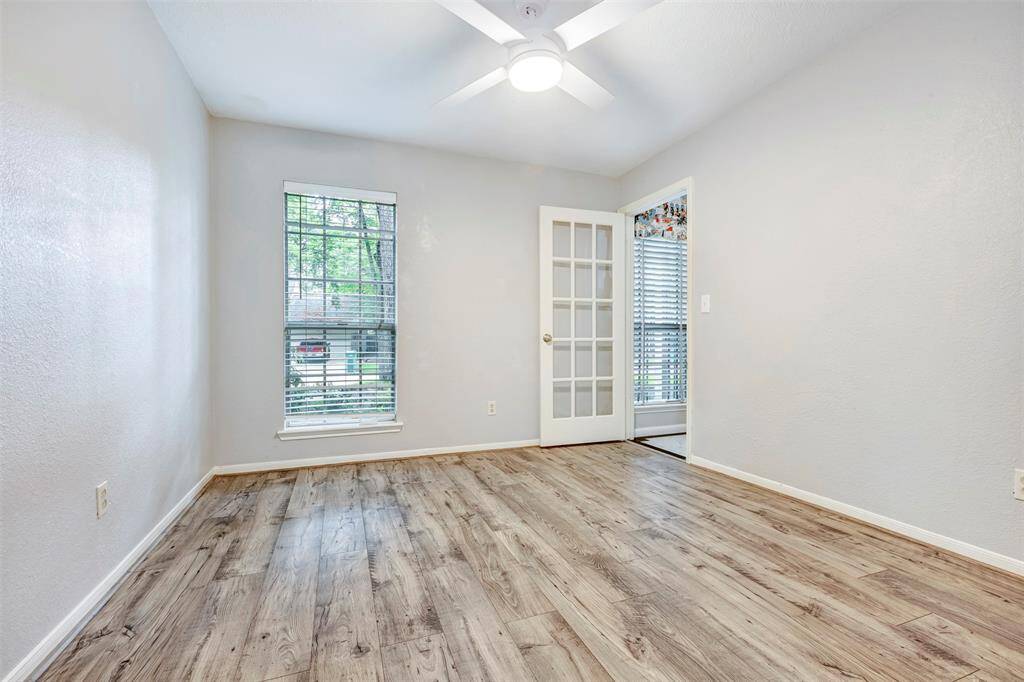 Elegant front living/formal dining area with new laminate wood-look flooring.