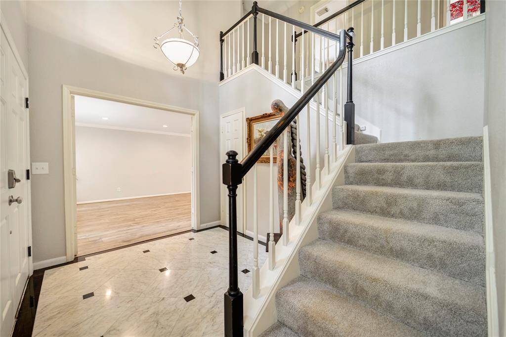 Entry way leading to the bedrooms upstairs.