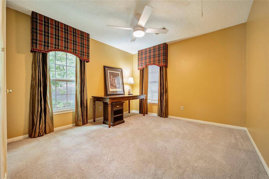 Bedroom upstairs at the front of the home.  Huge closet with Elfa shelving also.