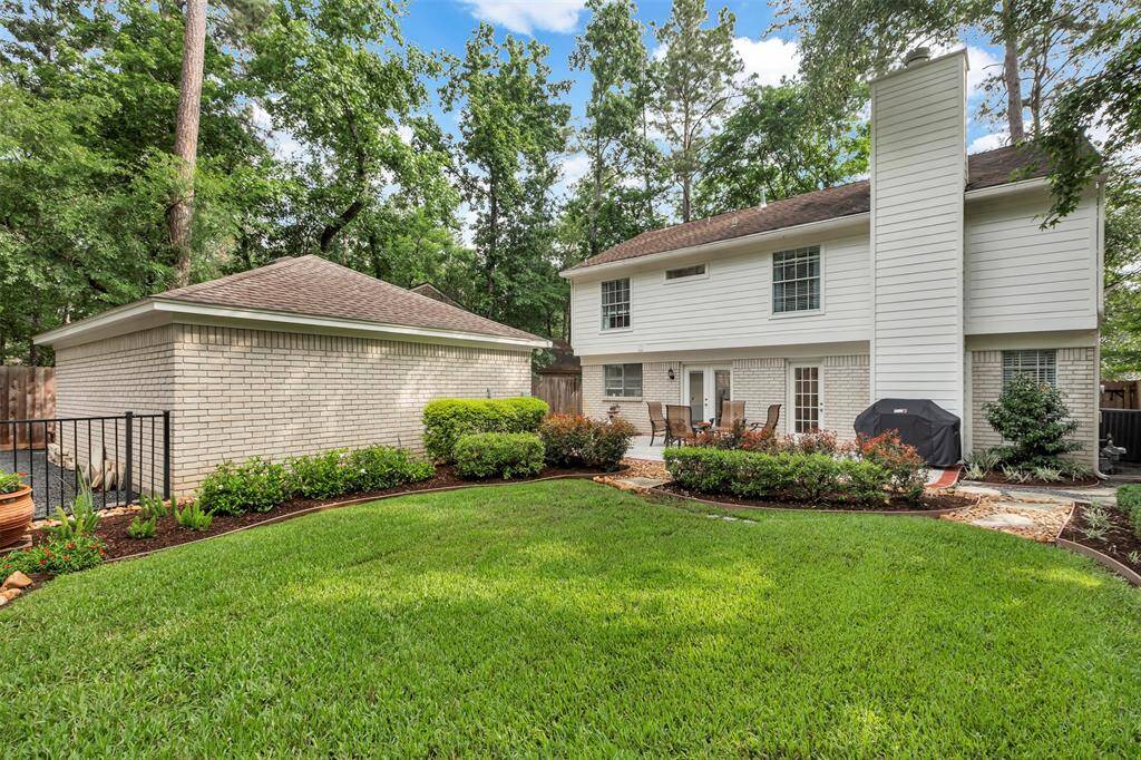 Enjoy beautiful professionally landscaped front and back gardens.