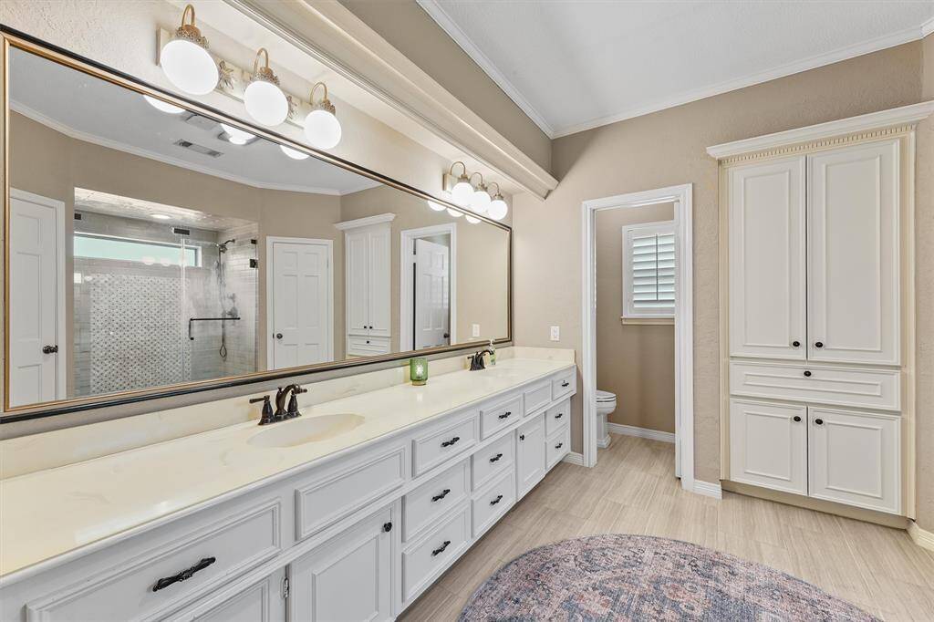 Double sinks, TWO walk-in closets and enclosed water closet.