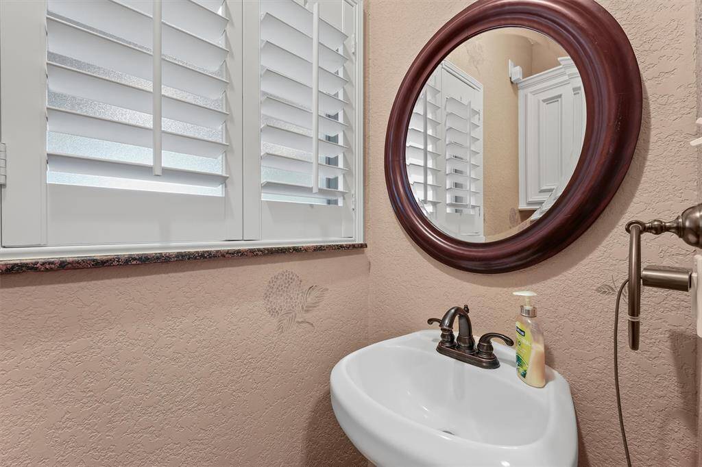 Powder room off the laundry room/kitchen.